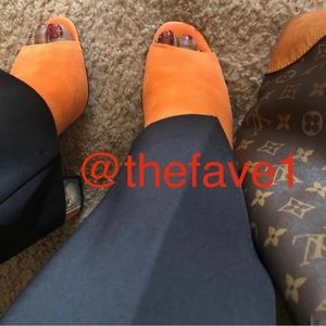 Orange Calvin Klein Booties size 9.5 with thick 4 in block heel